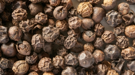 brown and gray stones on black surface